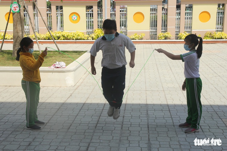Vietnam hamlet with nearly 1,600 people isolated after girl tests positive for COVID-19