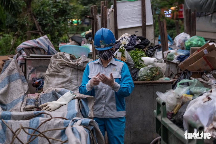 ‘Lucky to still have a job’: Hanoi sanitation workers brave the outdoors to keep city clean