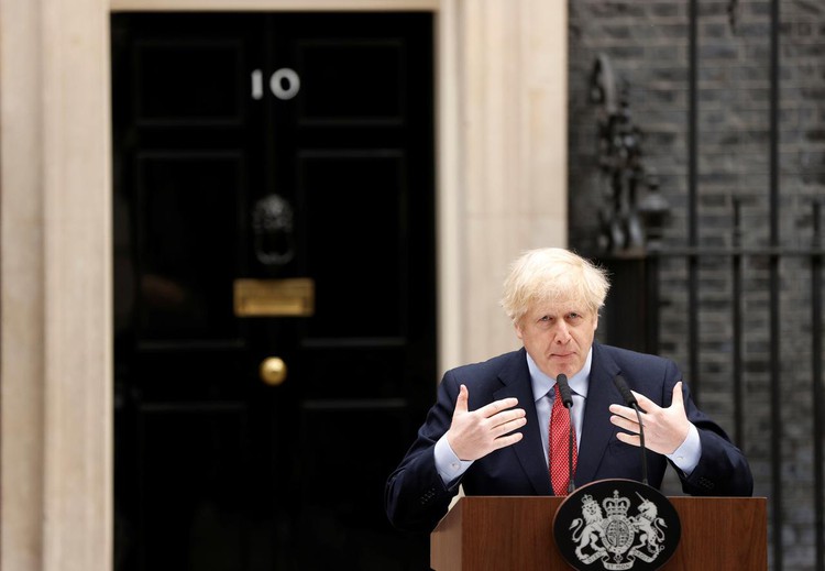 Back at work, British PM Johnson faces lockdown Catch-22