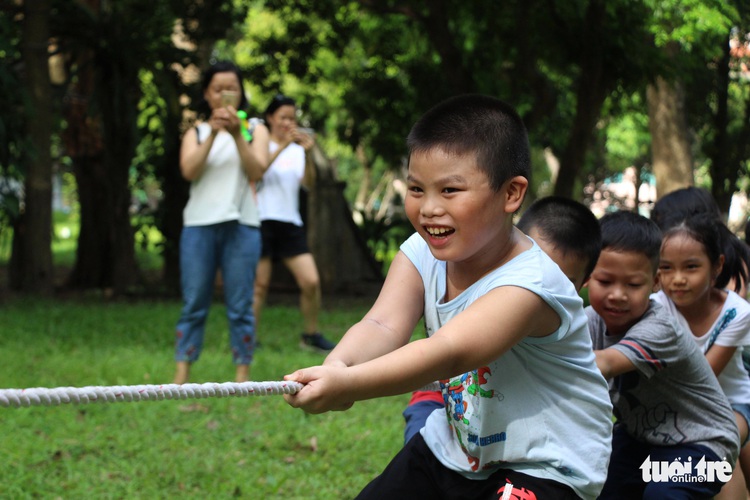 Children’s innocent happiness in Hanoi’s ‘kingdom of recycled materials’