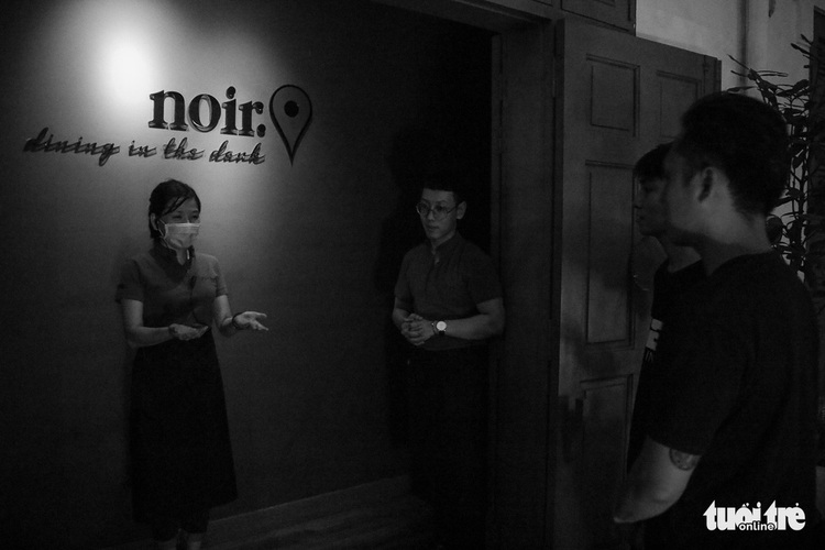 Eating in darkness: Saigon restaurant offers dining experience with blind, deaf servers