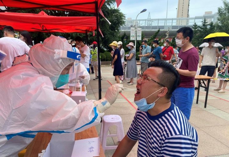 China reports virus spike as global cases pass 16 mn