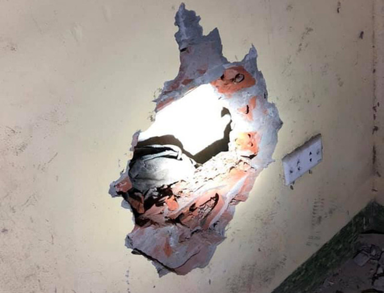 Abandoned baby rescued from narrow wall gap in Hanoi