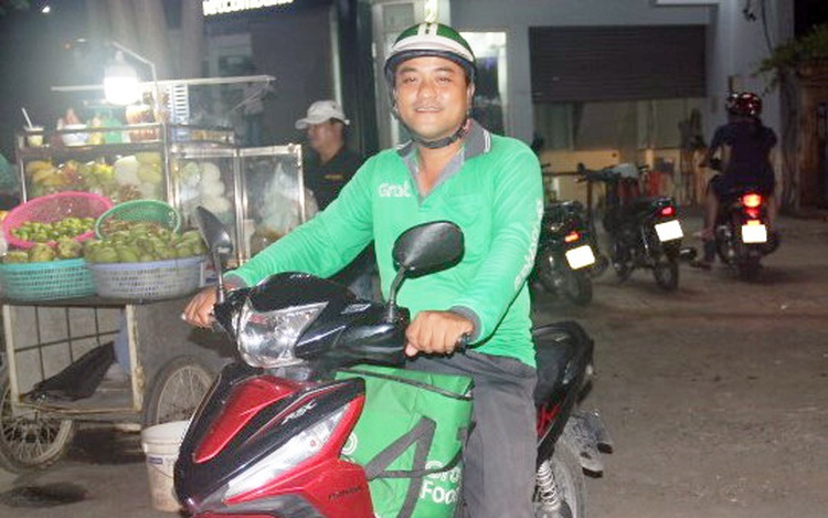 Ride-hailing app driver in Saigon to start college at 35