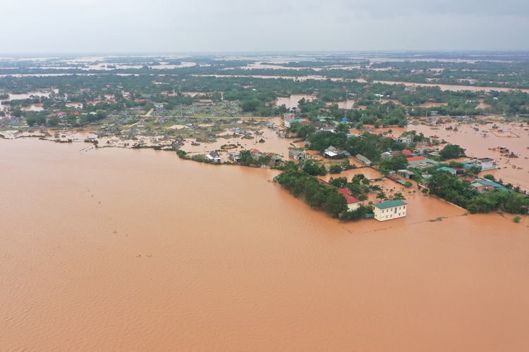 Historic flooding submerges villages in central Vietnamese province