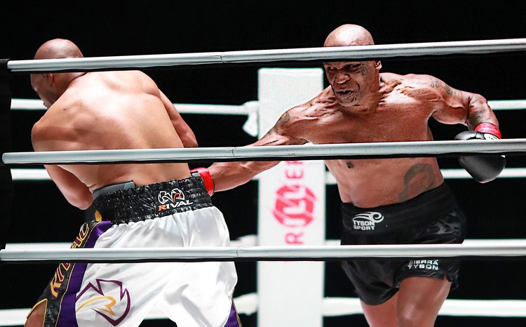 Tyson fights to draw with Jones Jr. in exhibition