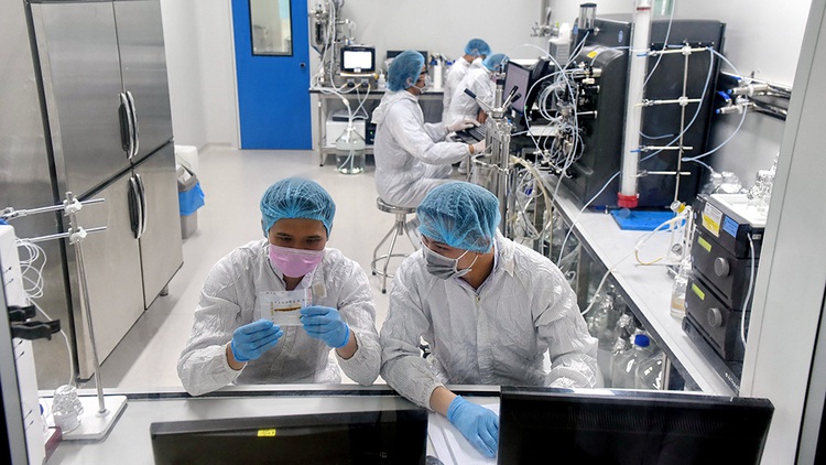 Vietnam kick-starts human trial of local COVID-19 vaccine
