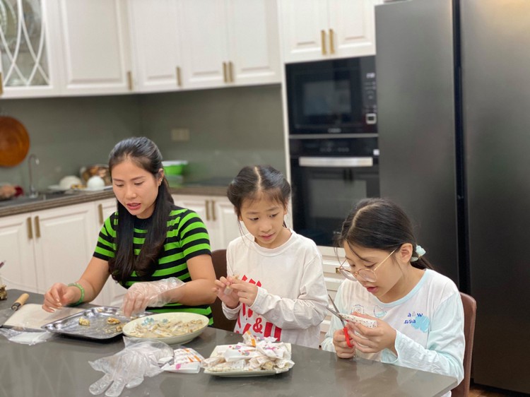Vietnamese woman balances work and maternity to run PPE company of nearly 400 people