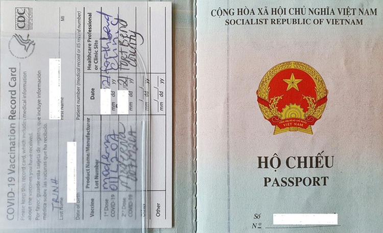 Vietnam quarantines Vietnamese-American doctor who holds 'vaccine passport'