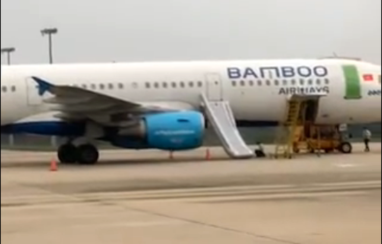 Vietnamese man fined for opening airplane emergency exit while aboard