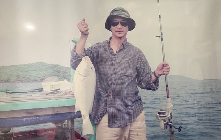 Vietnamese man fishes in father’s memory