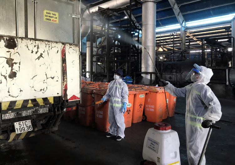 COVID-19 quarantine area waste piles high in Ho Chi Minh City
