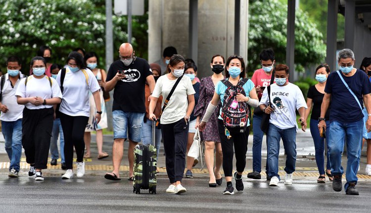 Singapore says cruise ship returns after suspected COVID-19 case