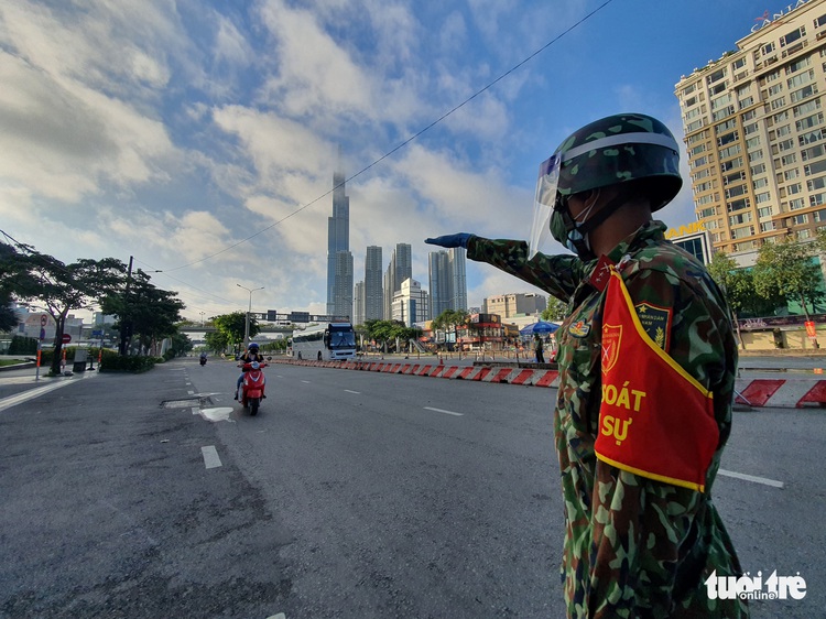 Commuters without valid travel documents turned back during Saigon’s shelter-in-place mandate
