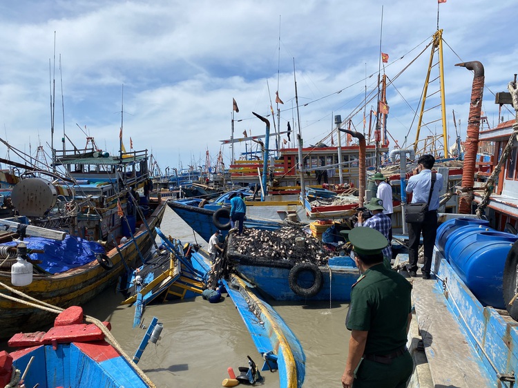 Nearly 100 fishing boats damaged as rains flood river in south-central Vietnam