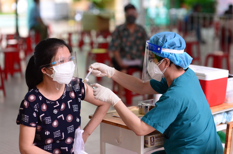 Who are eligible for green travel passes in Ho Chi Minh City?