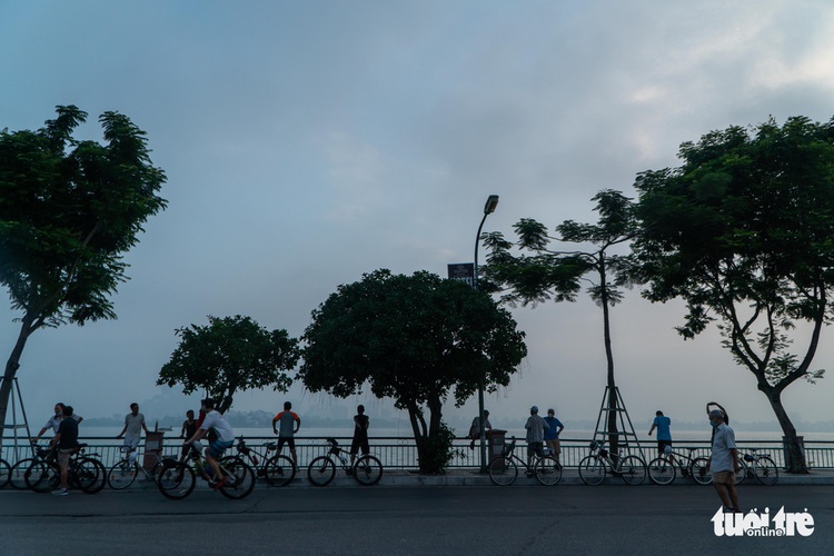Hanoi residents resume outdoor exercise habit following relaxed social distancing rules