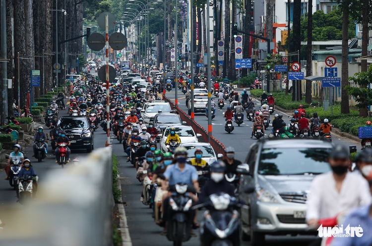 Ho Chi Minh City streets roar back to life after COVID-19 nadir