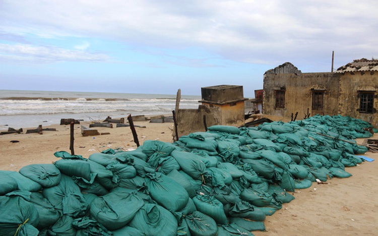 Coastal erosion eats away fishing village in central Vietnam