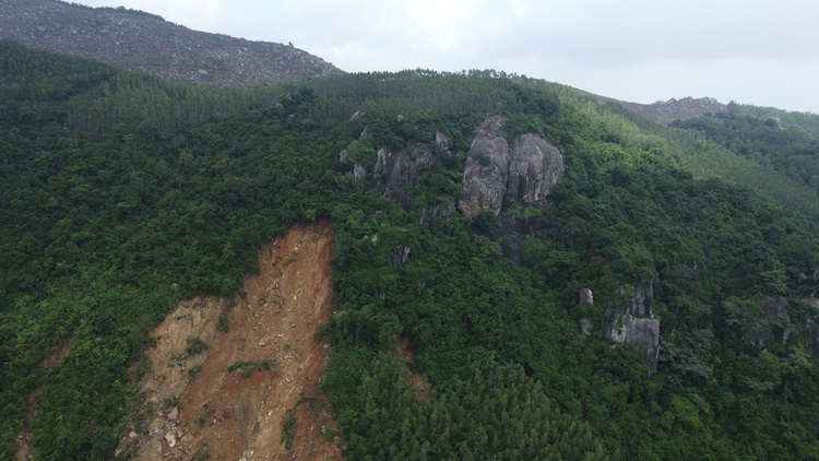 Hundreds clean up village enduring two landslides in south-central Vietnam