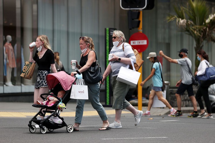 New Zealand to end tough COVID-19 curbs, adopt new virus-fighting system