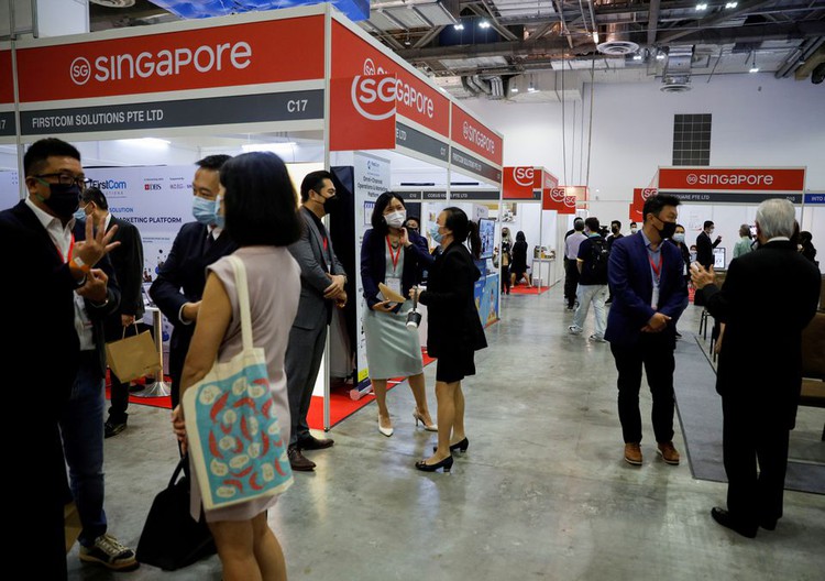 Singapore health minister says return to strict COVID-19 curbs a last resort