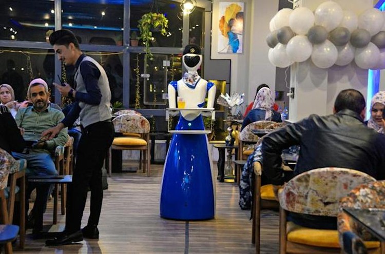 Robot waiters take Iraq's Mosulites back to the future