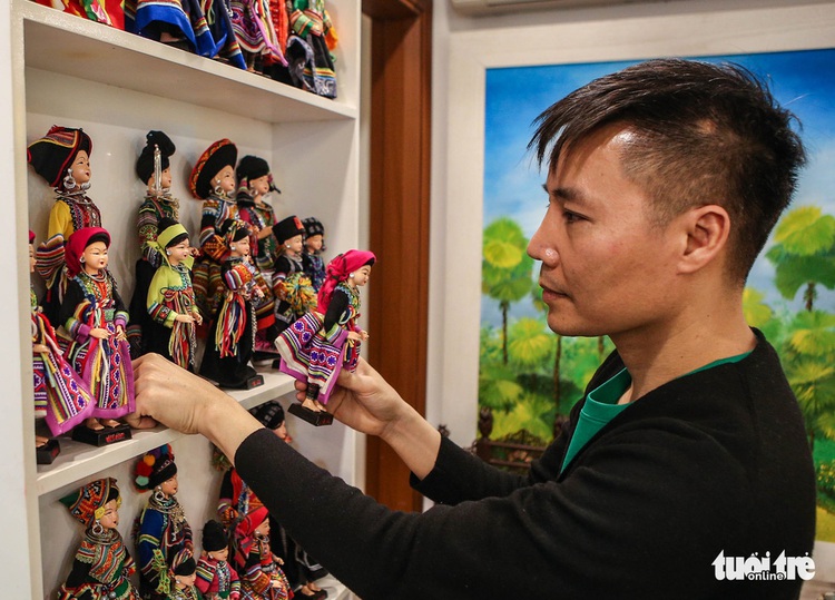 Draped in brocade: Hanoi artist glams up dolls with traditional Vietnamese attire