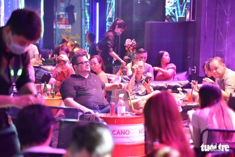 Ho Chi Minh City’s ‘backpacker street’ shows signs of revival as COVID-19 ban lifted