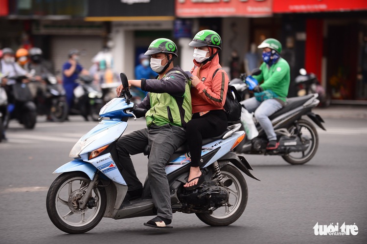 Soaring fuel prices torment app-based drivers in Ho Chi Minh City