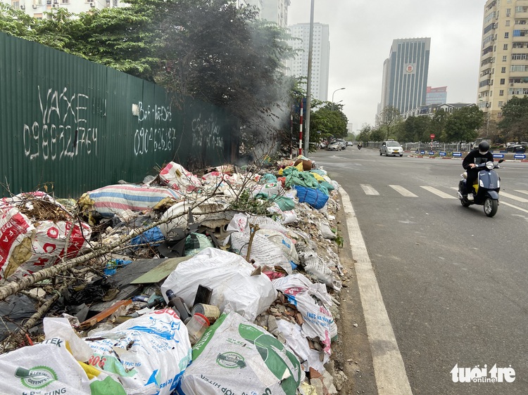 Hanoi streets become landfills as illegal dumping recurs