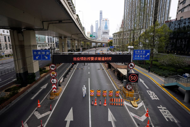 China's Shanghai split in two for COVID lockdown as asymptomatic cases surge