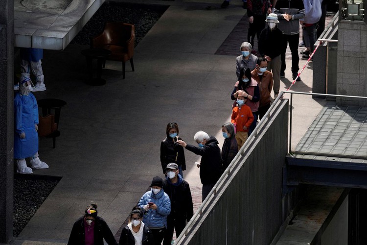 Shanghai to ease lockdown in some areas despite record COVID infections