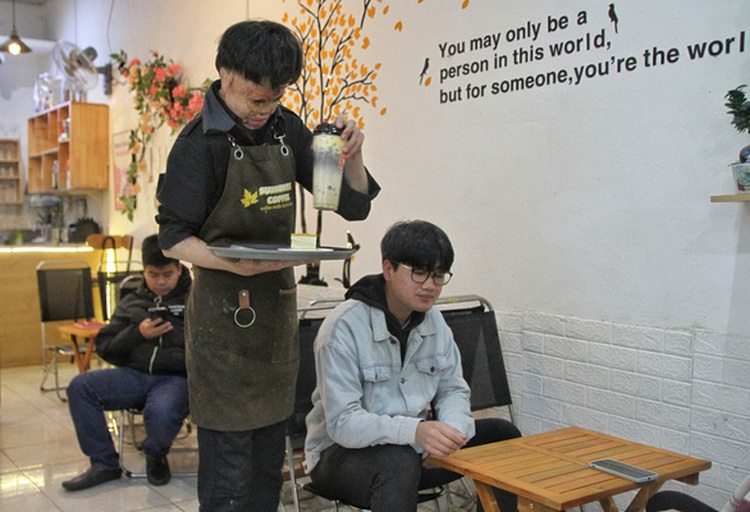 After a life spent hiding, Vietnamese burn victim steps into the spotlight with bakery