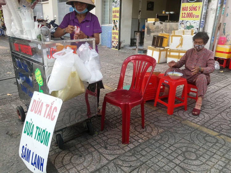 Cooling down on coconut water street in downtown Ho Chi Minh City