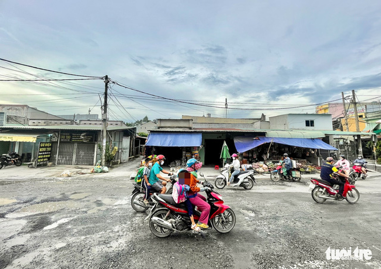 Street filled with potholes poses risks to commuters in Ho Chi Minh City