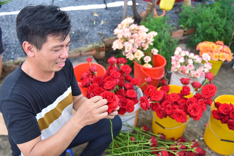 In southern Vietnam, couples favor massive wedding gates made from veggies