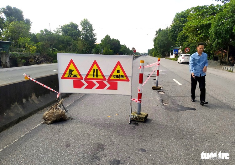 Large potholes appear on national highway after floodwater recedes in north-central Vietnam