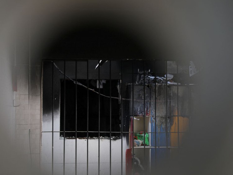 Fire in a children's shelter in Brazil leaves at least 4 dead, 13 injured