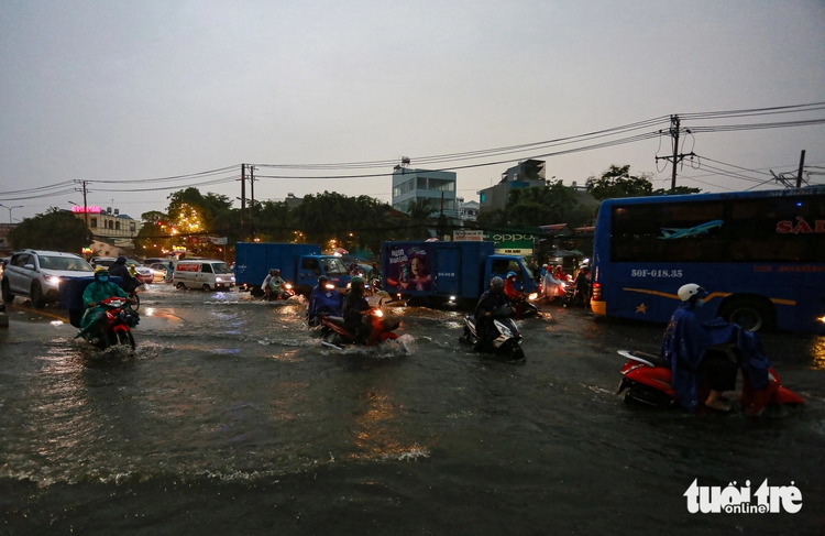 National highway in Ho Chi Minh City faces heavy flooding following downpour