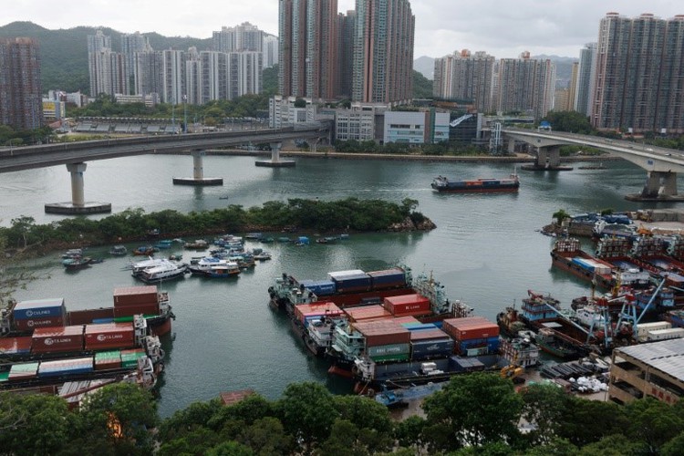 Thousands evacuated as typhoon nears southern China, Vietnam