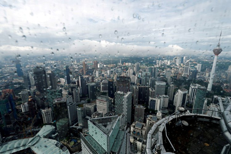 Malaysia prepares to make rain, close schools as haze worsens