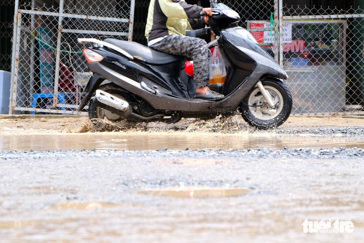 Poor road conditions make life tougher for students in suburban Ho Chi Minh City