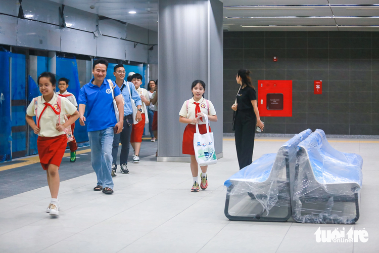 Elementary school students visit underground metro station in Ho Chi Minh City