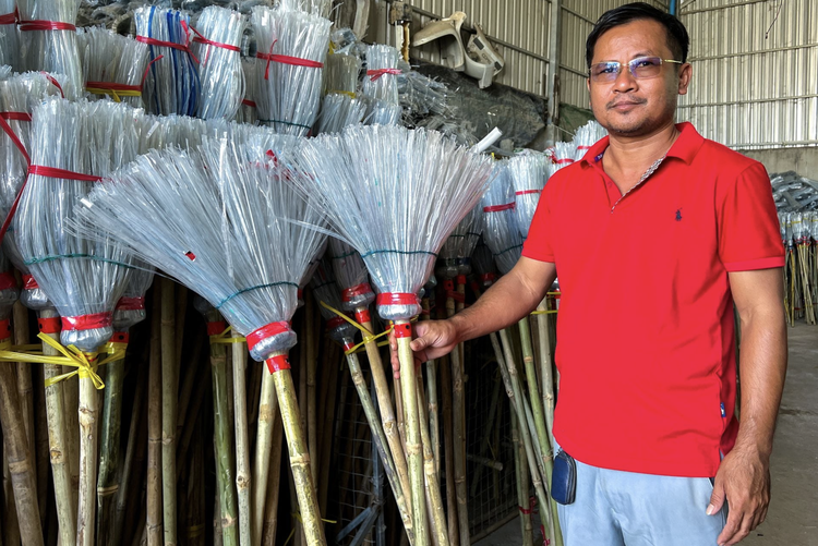Cambodia 'upcycler' turns tonnes of plastic bottles into brooms