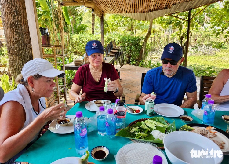 Foreign visitors fascinated with countryside tour by bicycle in Vietnam’s Nha Trang
