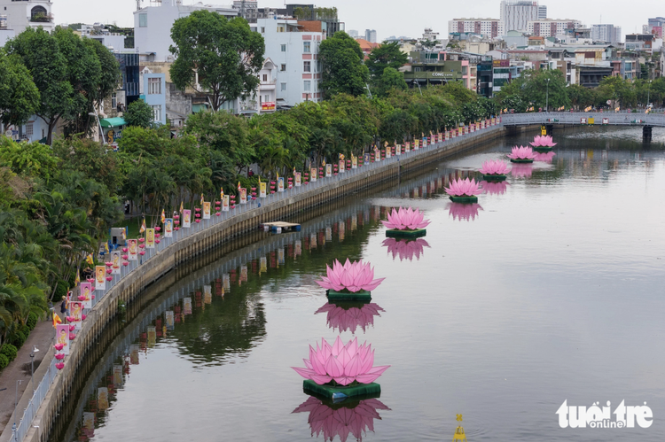Ho Chi Minh City pagodas, streets festooned with colorful lanterns, flags in preparation for Buddha’s Birthday