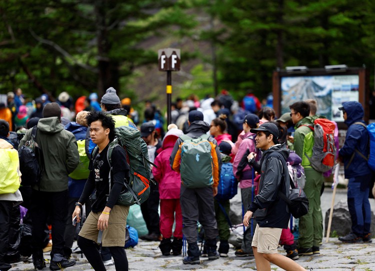 Japan imposes new fees on Mount Fuji climbers to limit tourists