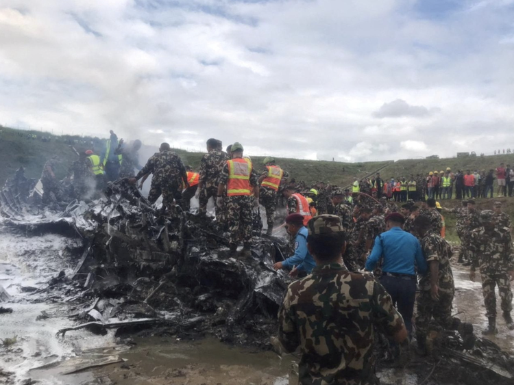 Plane crash at Nepal's Kathmandu airport kills 18