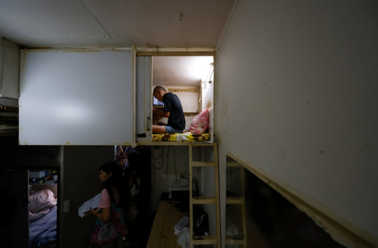 Hong Kong struggles to improve conditions in tiny, crowded homes